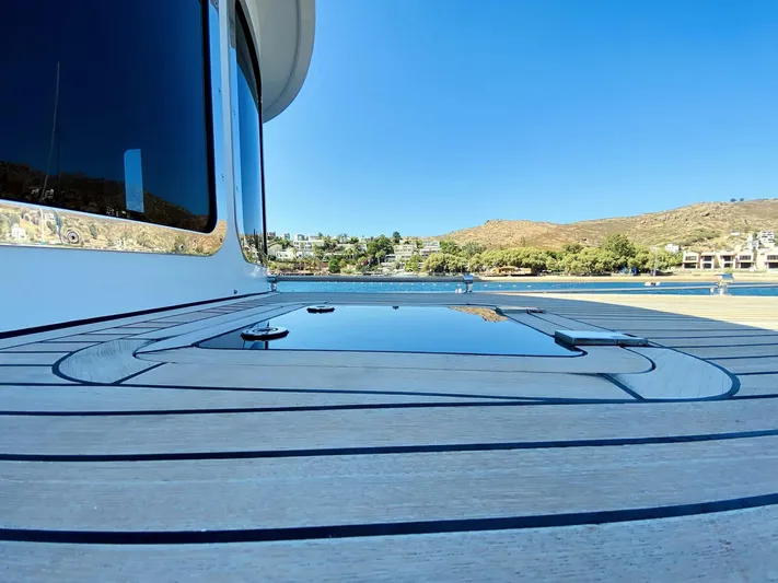  Yacht Photos Pics Ada Yacht Steel Trawler 2014, deck view with scenic background.