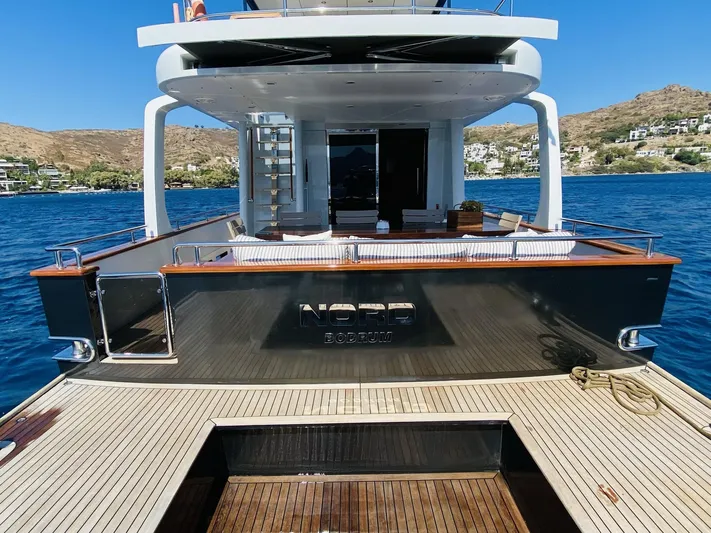  Yacht Photos Pics Luxurious 2014 Ada Yacht Steel Trawler on serene blue waters, showcasing elegant deck design.