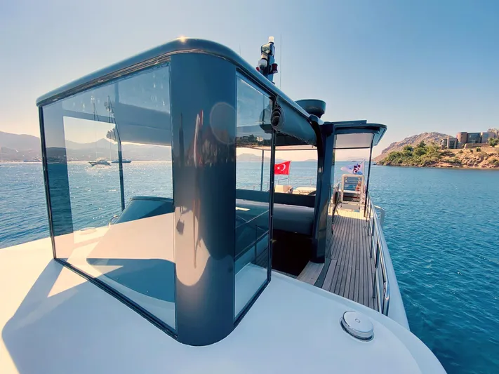  Yacht Photos Pics Ada Yacht Steel Trawler 2014 on serene blue waters, showcasing sleek design and luxury.