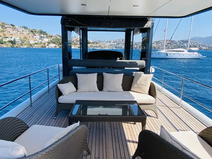  Yacht Photos Pics Luxurious Ada Yacht Steel Trawler 2014 with elegant deck seating and scenic ocean view.