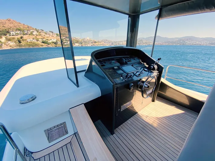  Yacht Photos Pics Helm of 2014 Ada Yacht Steel Trawler with scenic ocean view.