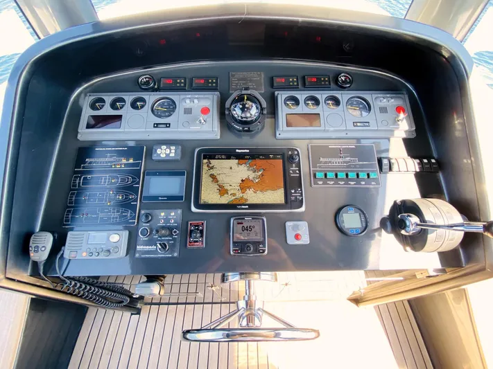  Yacht Photos Pics Cockpit of 2014 Ada Yacht Steel Trawler with navigation instruments and controls.