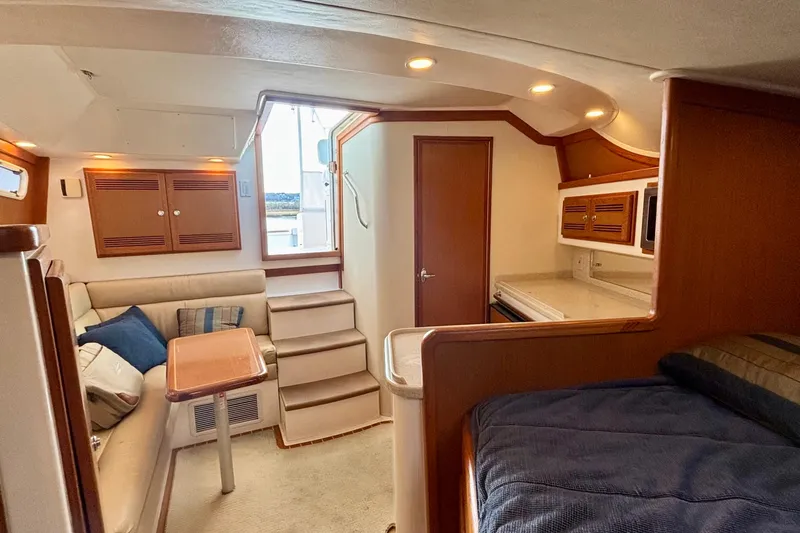 Niala Yacht Photos Pics Interior of 2004 Cabo 35 Express Sportfish with cozy seating and modern amenities.