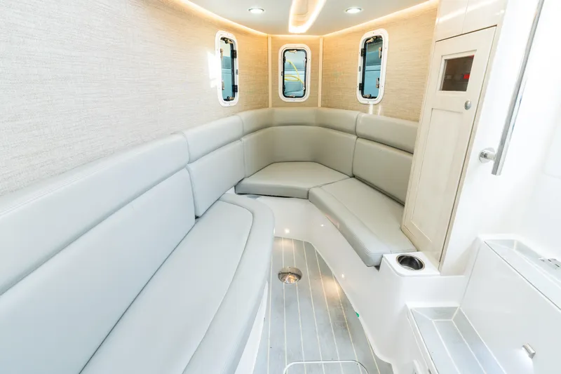  Yacht Photos Pics Luxurious interior of 2023 HCB 42 Lujo boat with elegant seating and modern design.