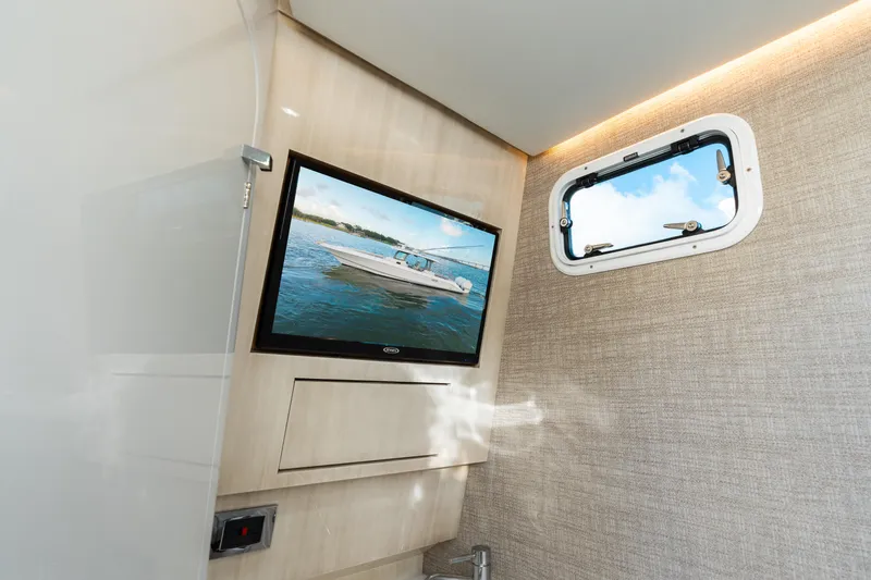  Yacht Photos Pics Interior of 2023 HCB 42 Lujo boat with TV and window view.