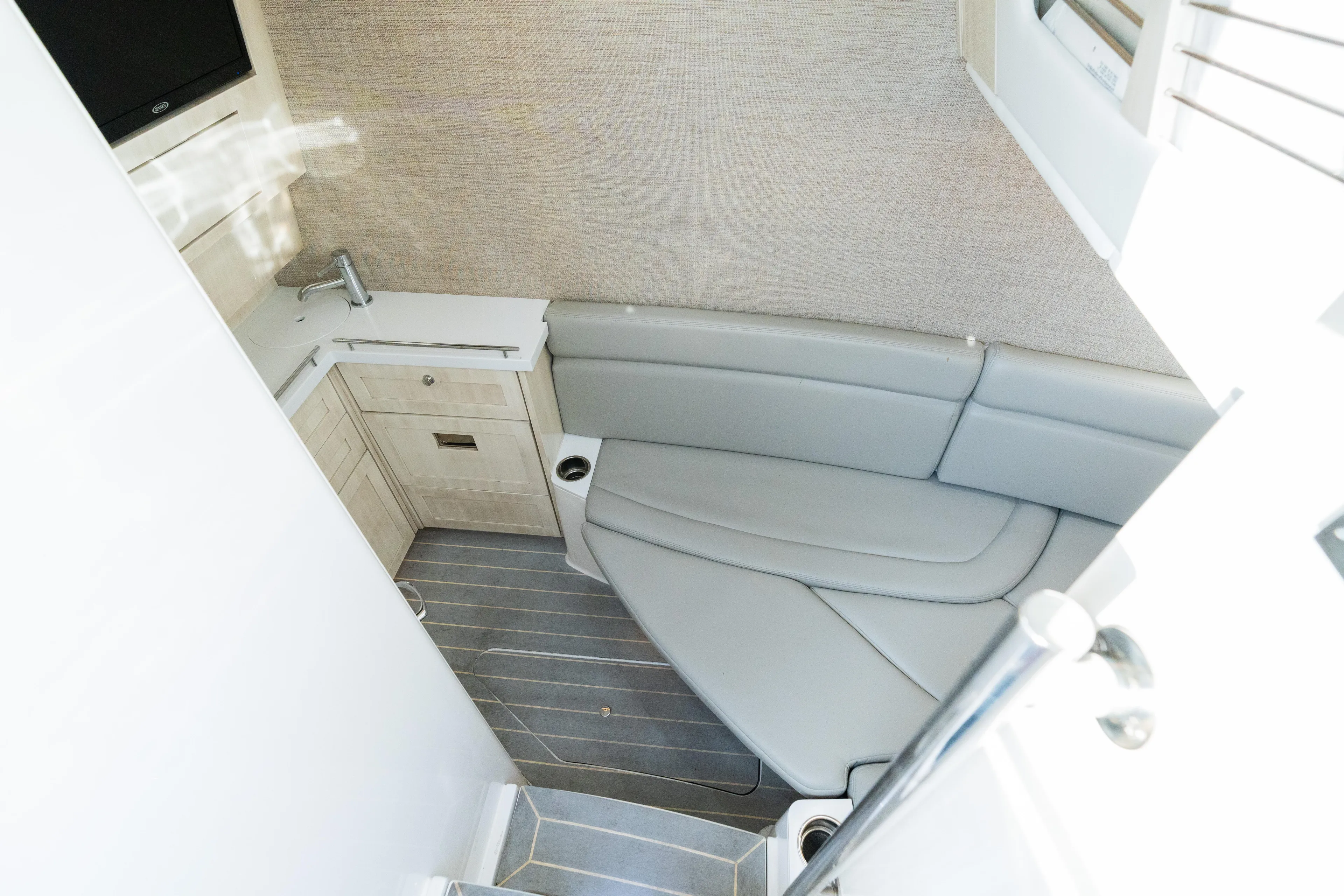  Yacht Photos Pics Luxurious interior of 2023 HCB 42 Lujo boat with sleek seating and modern amenities.