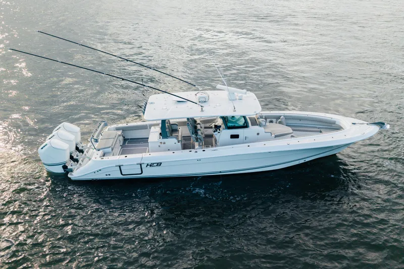  Yacht Photos Pics 2023 HCB 42 Lujo boat on water, featuring sleek design and powerful engines.