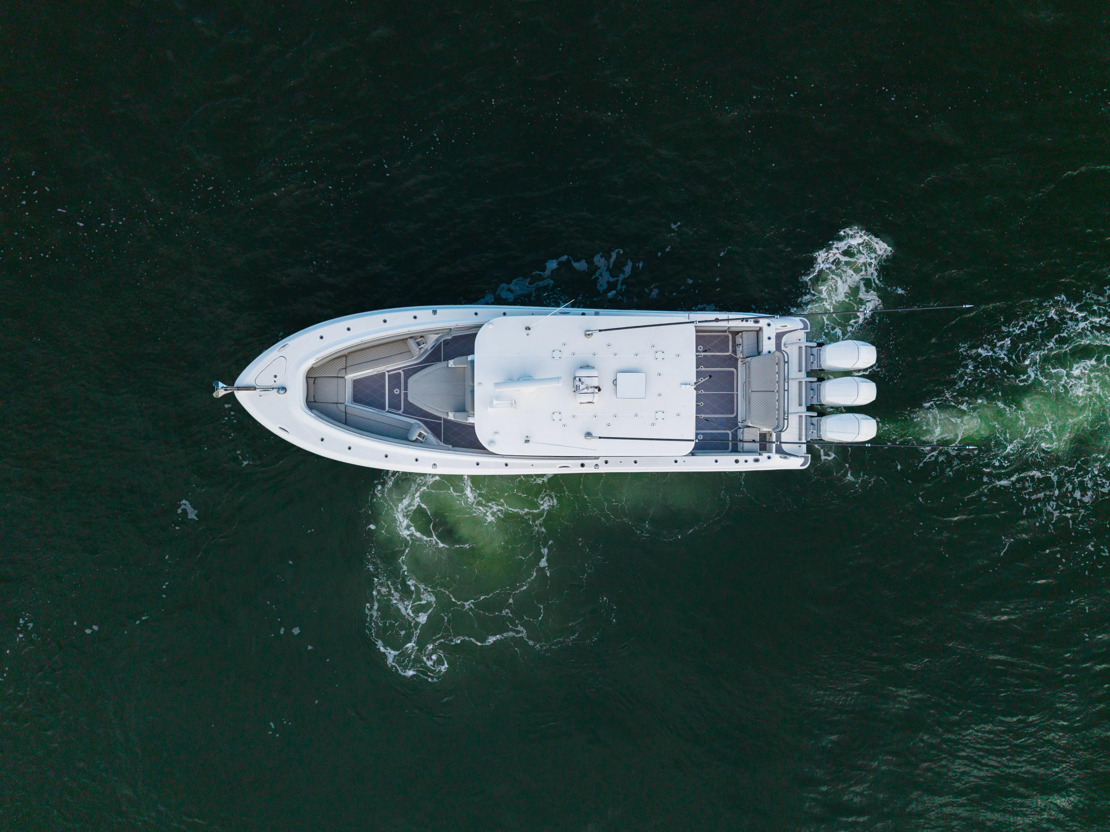  Yacht Photos Pics Aerial view of 2023 HCB 42 Lujo boat cruising on water.