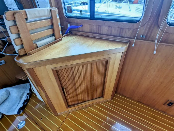  Yacht Photos Pics 2003 Sabre 36 Flybridge interior with wooden cabinetry and seating.