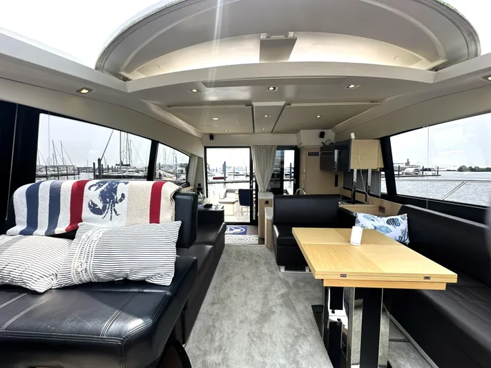 Grand Cru Yacht Photos Pics Luxurious interior of a 2017 Prestige 500 S yacht with modern seating and decor.