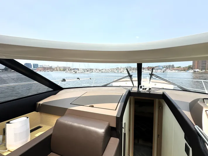 Grand Cru Yacht Photos Pics Interior view of 2017 Prestige 500 S yacht with marina in background.