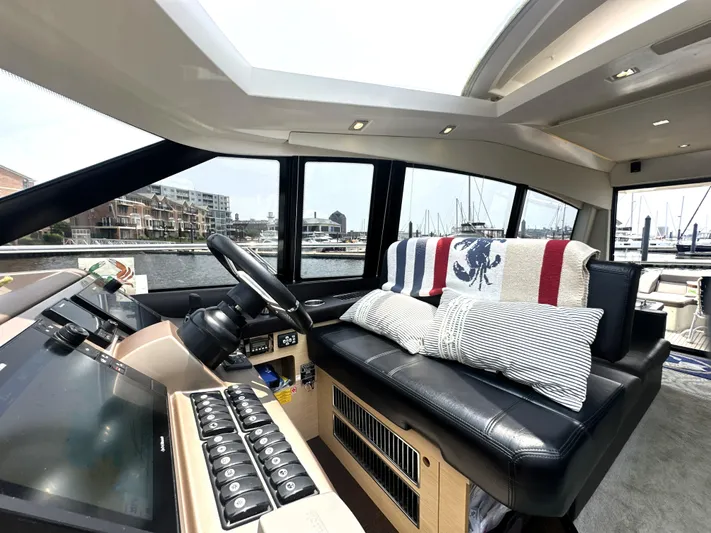 Grand Cru Yacht Photos Pics Interior of 2017 Prestige 500 S yacht with modern helm and cozy seating.