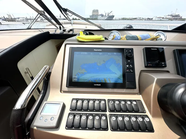 Grand Cru Yacht Photos Pics Control panel of a 2017 Prestige 500 S yacht with navigation display.