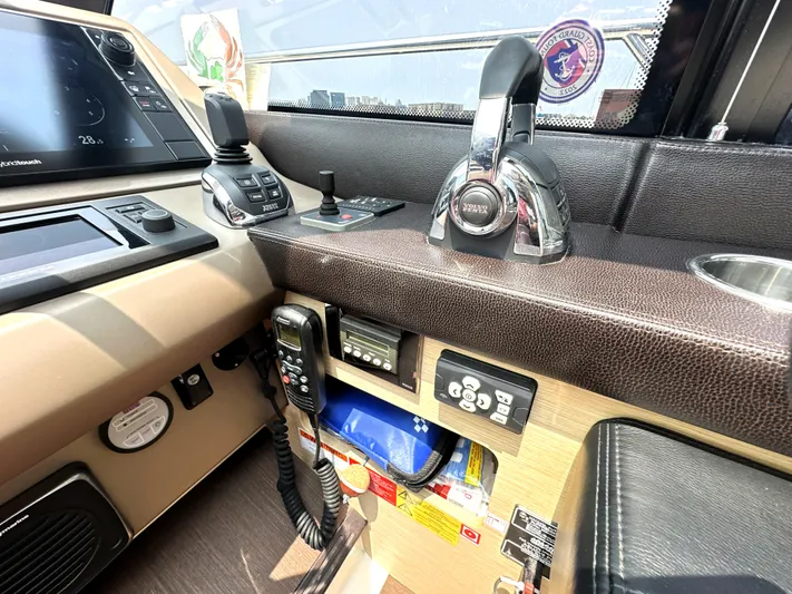 Grand Cru Yacht Photos Pics Control panel of a 2017 Prestige 500 S yacht with navigation equipment.