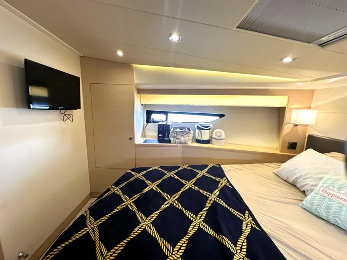 Grand Cru Yacht Photos Pics Luxurious cabin interior of 2017 Prestige 500 S yacht with modern decor and cozy bedding.