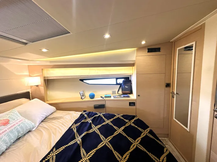 Grand Cru Yacht Photos Pics Luxurious cabin interior of 2017 Prestige 500 S yacht with modern decor and cozy bedding.