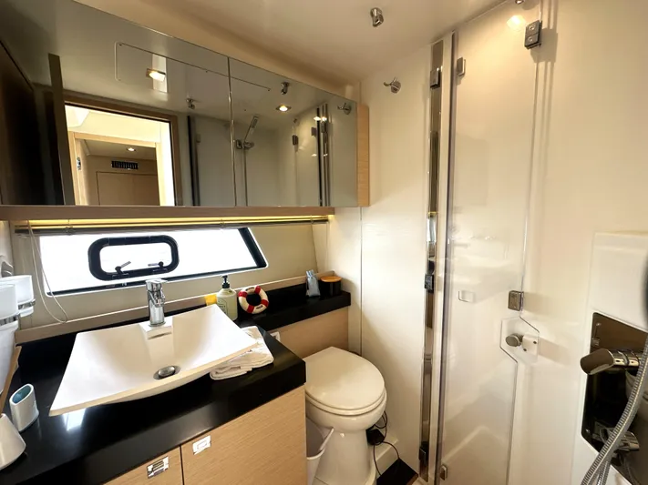 Grand Cru Yacht Photos Pics Luxurious bathroom in 2017 Prestige 500 S yacht with modern fixtures and sleek design.