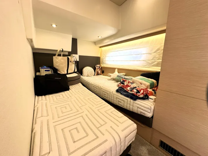 Grand Cru Yacht Photos Pics Cozy cabin interior of 2017 Prestige 500 S yacht with twin beds and soft lighting.