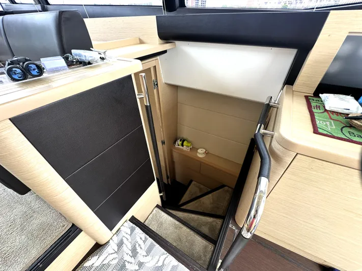 Grand Cru Yacht Photos Pics Interior stairs of 2017 Prestige 500 S yacht, featuring modern design and wood finish.