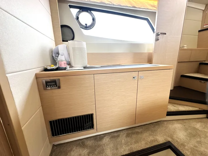 Grand Cru Yacht Photos Pics Interior of 2017 Prestige 500 S yacht with wooden cabinetry and modern design.