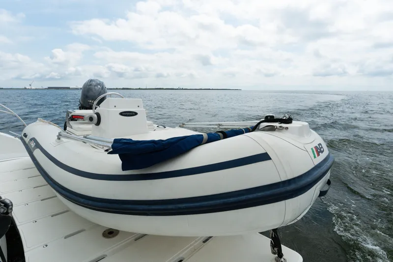 Walkabout Yacht Photos Pics Inflatable boat on Royal Cape Catamarans Majestic 530, 2019, cruising on open water.