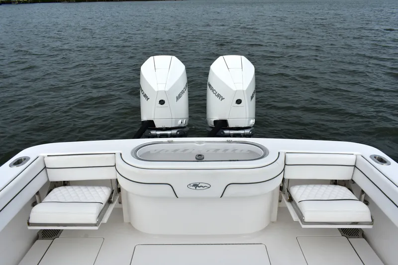 Low Key Yacht Photos Pics Valhalla V-33 2021 boat with dual Mercury engines on open water.