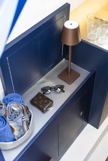 Granturismo 14.0 X Yacht Photos Pics 2024 Lomac GranTurismo 14.0 interior with lamp, sunglasses, wallet, and towels.