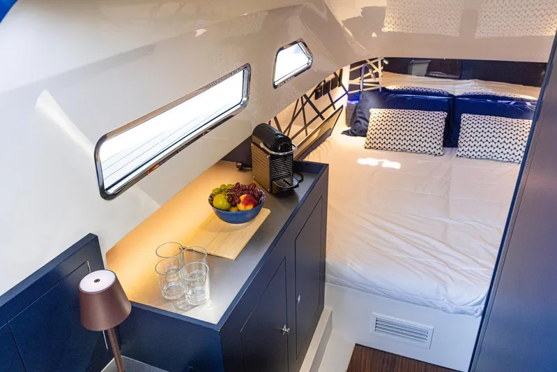Granturismo 14.0 X Yacht Photos Pics Luxurious cabin interior of 2024 Lomac GranTurismo 14.0 with cozy bed and modern amenities.