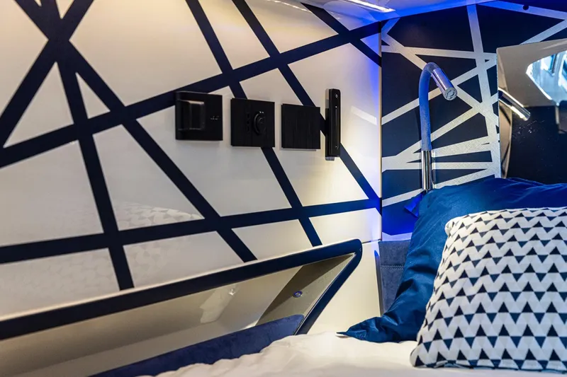 Granturismo 14.0 X Yacht Photos Pics 2024 Lomac GranTurismo 14.0 interior with modern geometric design and stylish bedding.