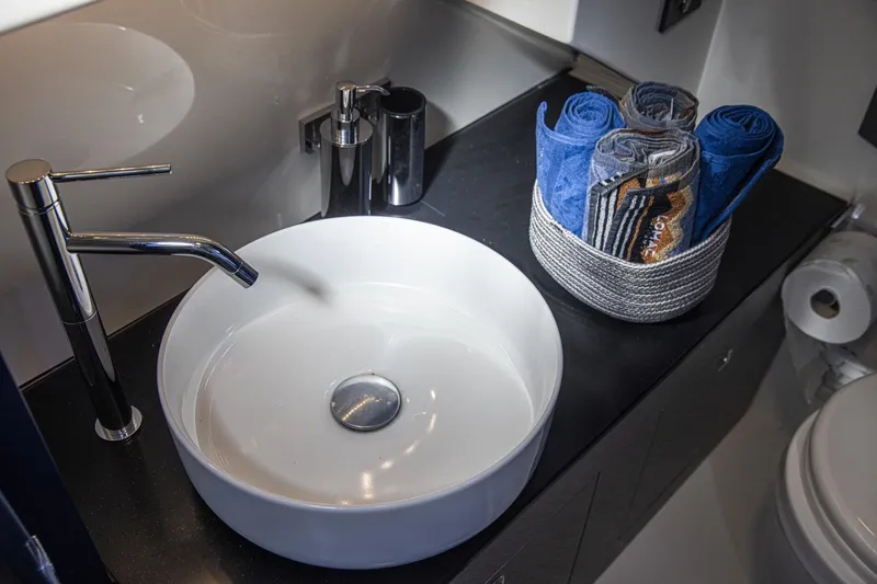 Granturismo 14.0 X Yacht Photos Pics Modern bathroom sink with rolled towels on Lomac GranTurismo 14.0, 2024 model.