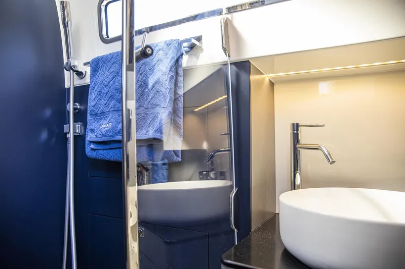 Granturismo 14.0 X Yacht Photos Pics Luxurious bathroom interior of 2024 Lomac GranTurismo 14.0 yacht with modern fixtures.