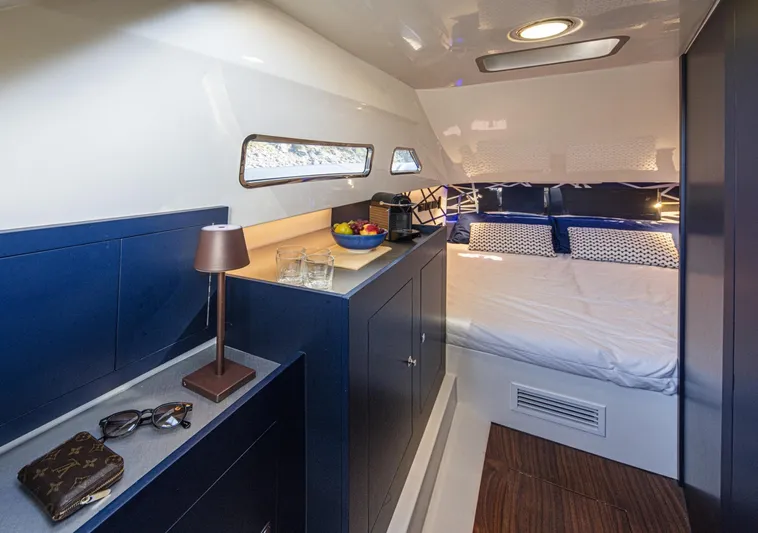 Granturismo 14.0 X Yacht Photos Pics Luxurious cabin interior of 2024 Lomac GranTurismo 14.0 with bed and modern amenities.