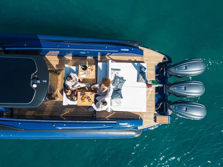 Granturismo 14.0 X Yacht Photos Pics Overhead view of 2024 Lomac GranTurismo 14.0 yacht with people relaxing on deck.