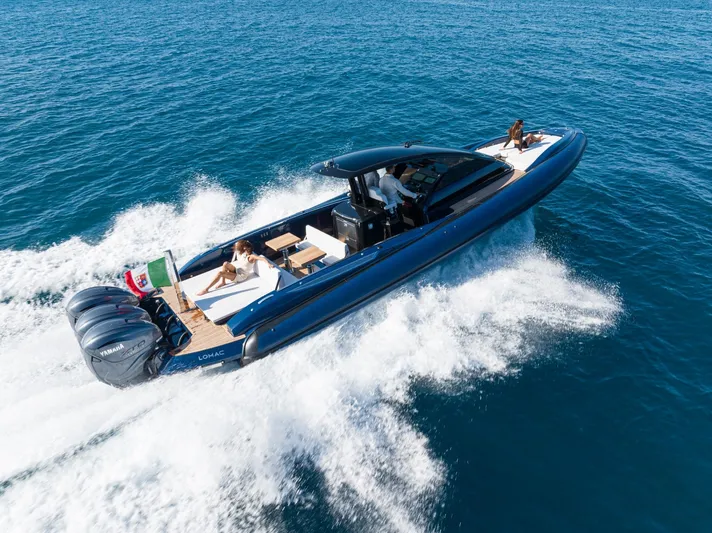 Granturismo 14.0 X Yacht Photos Pics 2024 Lomac GranTurismo 14.0 cruising on open water, showcasing luxury and speed.