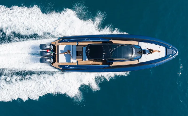 Granturismo 14.0 X Yacht Photos Pics 2024 Lomac GranTurismo 14.0 yacht cruising on open water, aerial view.