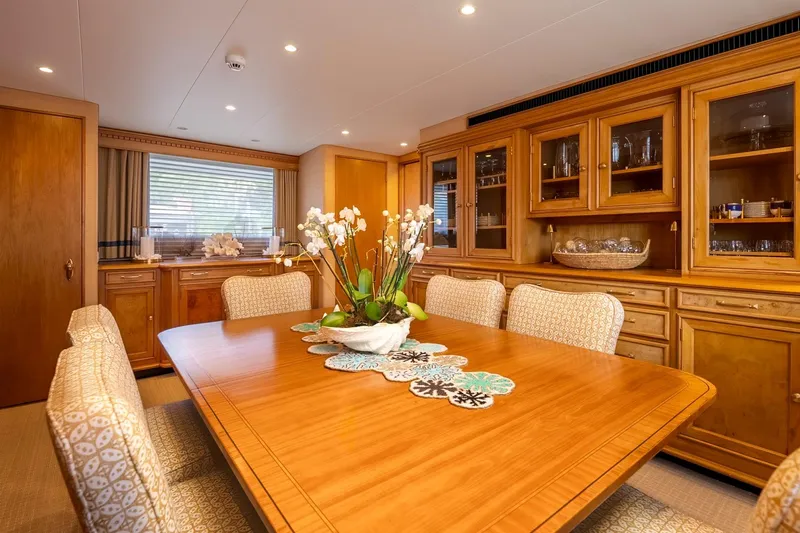 Stoneface Yacht Photos Pics Luxurious yacht dining room with wooden furniture and elegant decor, Burger Custom 1978.