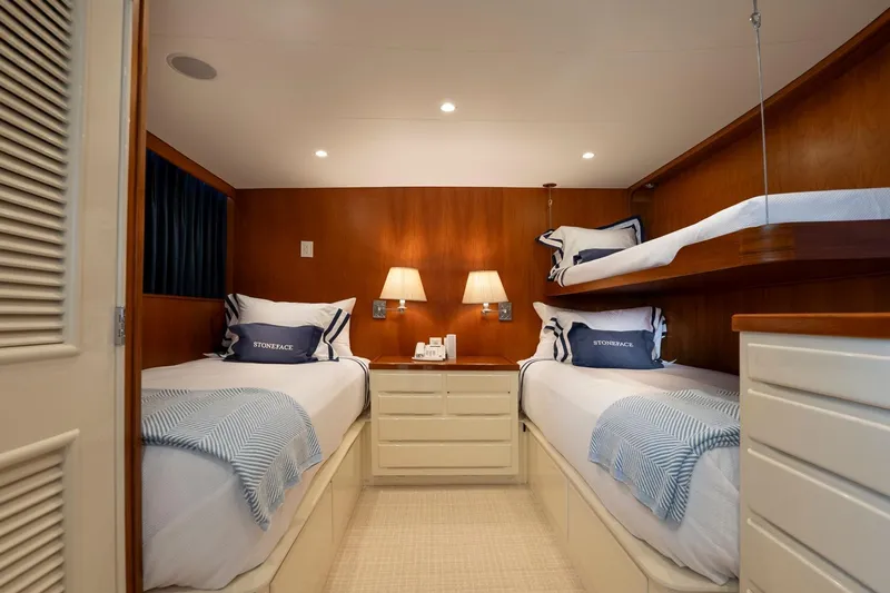 Stoneface Yacht Photos Pics Luxurious 1978 Burger Custom yacht cabin with twin beds and elegant wood paneling.
