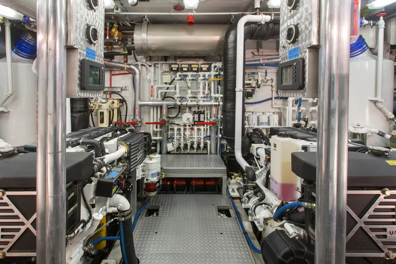 Stoneface Yacht Photos Pics Engine room of a 1978 Burger yacht with complex machinery and control panels.