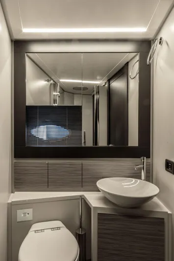 Good Vibes Yacht Photos Pics Modern bathroom interior on 2020 Pershing 62' yacht with sleek design and vessel sink.