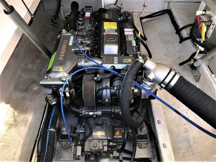 Lady In Blue Yacht Photos Pics Engine compartment of a 2012 Back Cove 30 boat, showcasing detailed mechanical components.