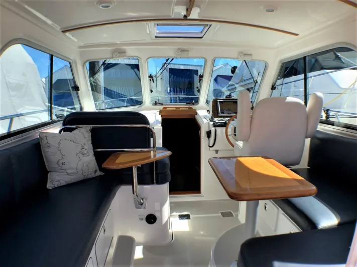 Lady In Blue Yacht Photos Pics Interior of 2012 Back Cove 30 boat with seating and navigation area.