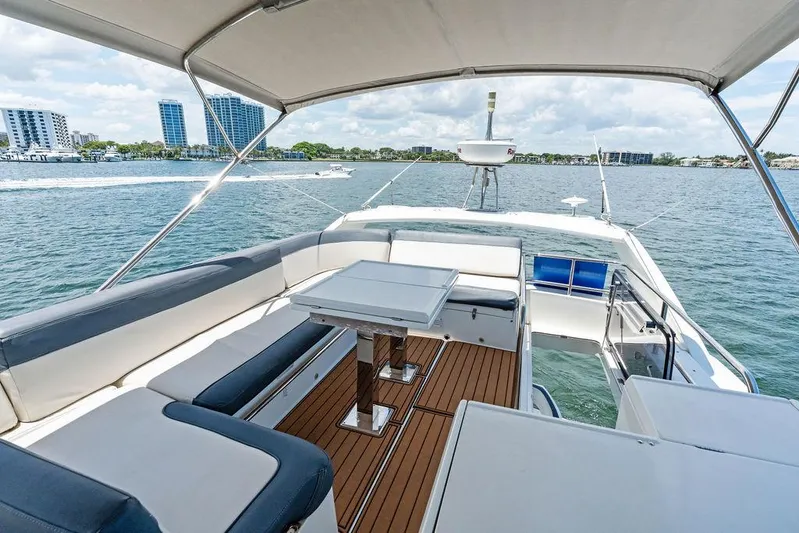 Sea Whisperer Yacht Photos Pics Luxurious 2019 Galeon 500 Fly yacht with spacious deck and scenic waterfront view.