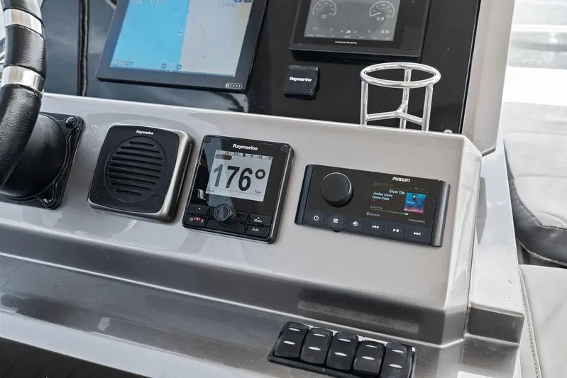 Sea Whisperer Yacht Photos Pics Control panel of 2019 Galeon 500 Fly yacht with navigation and audio systems.