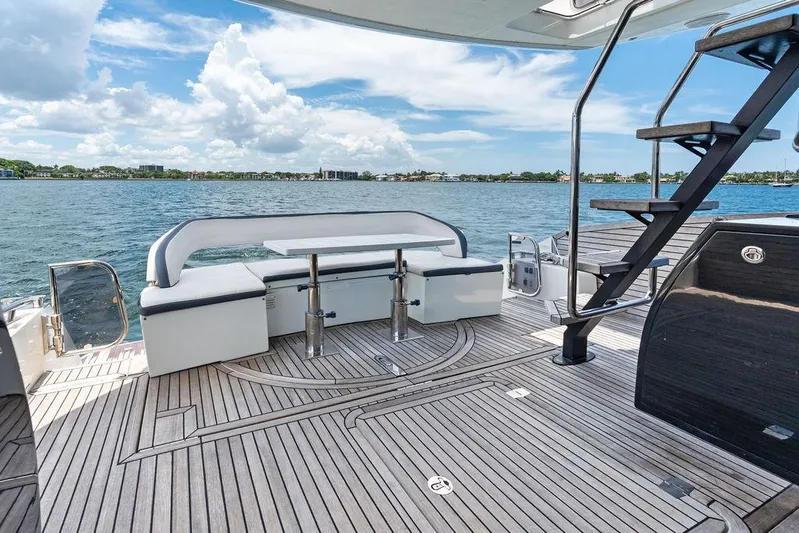 Sea Whisperer Yacht Photos Pics Luxurious 2019 Galeon 500 Fly yacht deck with seating and ocean view.