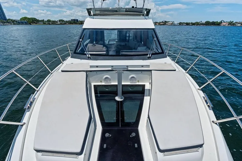 Sea Whisperer Yacht Photos Pics 2019 Galeon 500 Fly yacht on water, showcasing sleek deck and modern design.