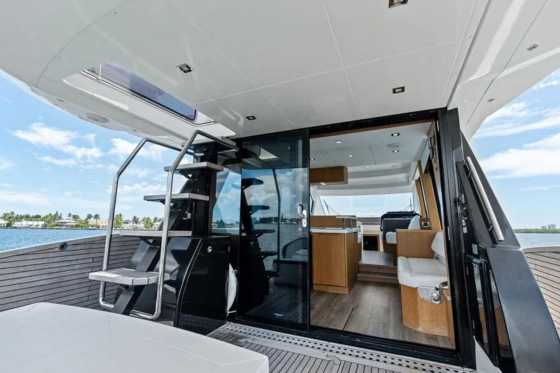 Sea Whisperer Yacht Photos Pics 2019 Galeon 500 Fly yacht interior with modern design and open deck view.