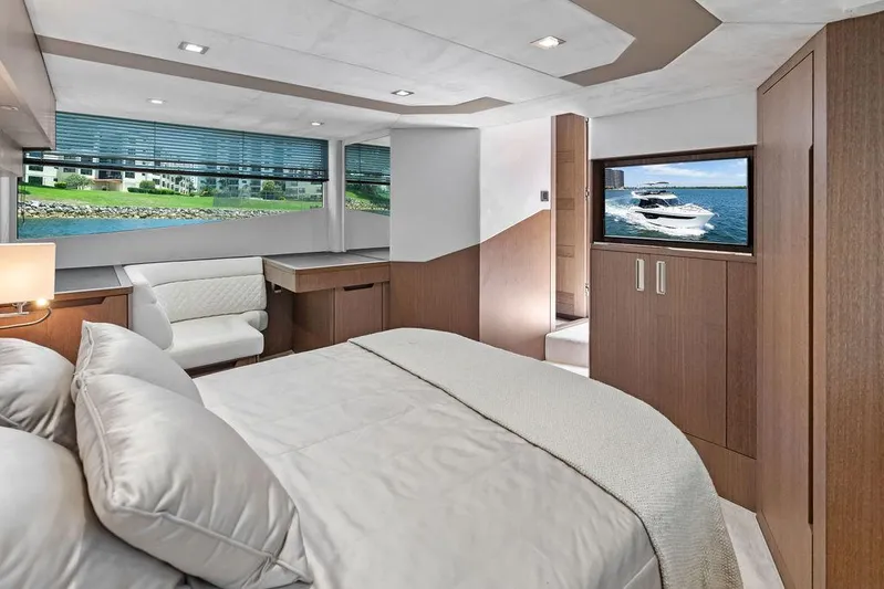 Sea Whisperer Yacht Photos Pics Luxurious interior of 2019 Galeon 500 Fly yacht with elegant bedroom and scenic views.