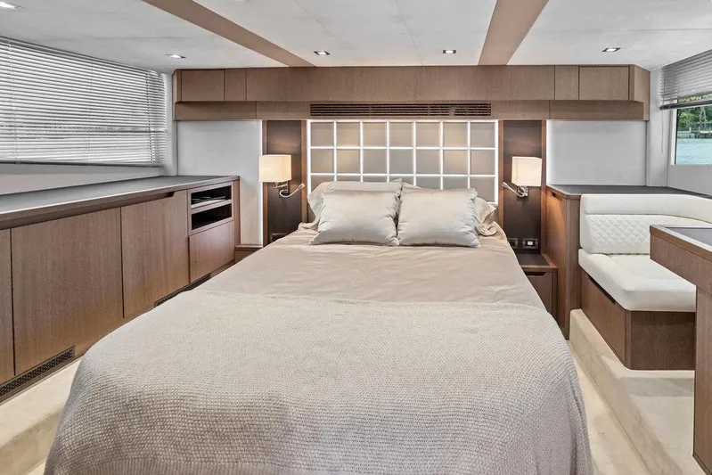 Sea Whisperer Yacht Photos Pics Luxurious bedroom interior of 2019 Galeon 500 Fly yacht with modern design and cozy ambiance.