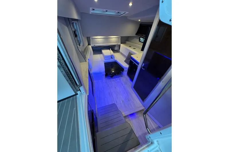 Sea Winds Yacht Photos Pics Interior of 2020 Formula 400 Super Sport Crossover with modern lighting and seating.