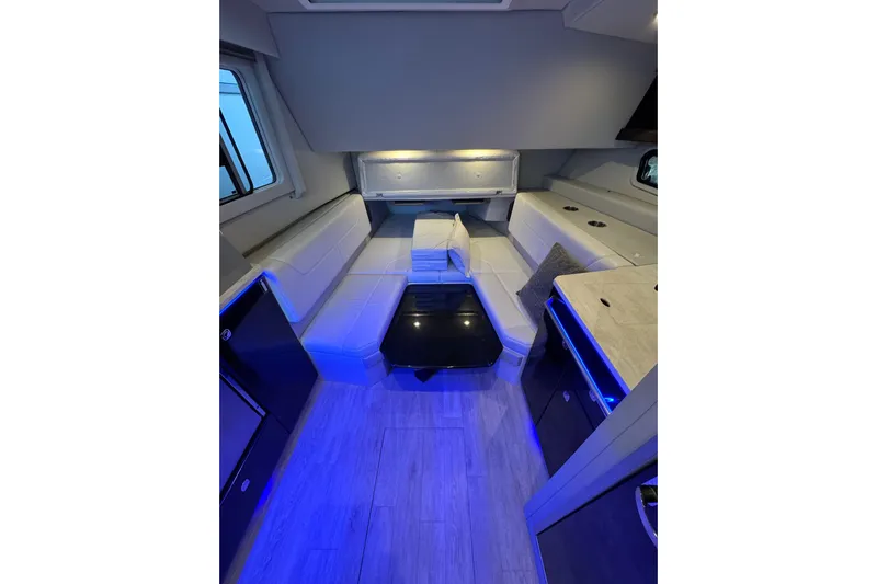 Sea Winds Yacht Photos Pics 2020 Formula 400 Super Sport Crossover interior with modern seating and ambient lighting.